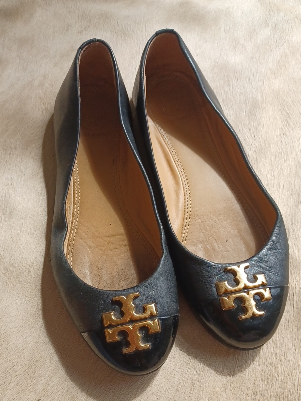 Tory Burch Black Flats With Massive Gold Logo